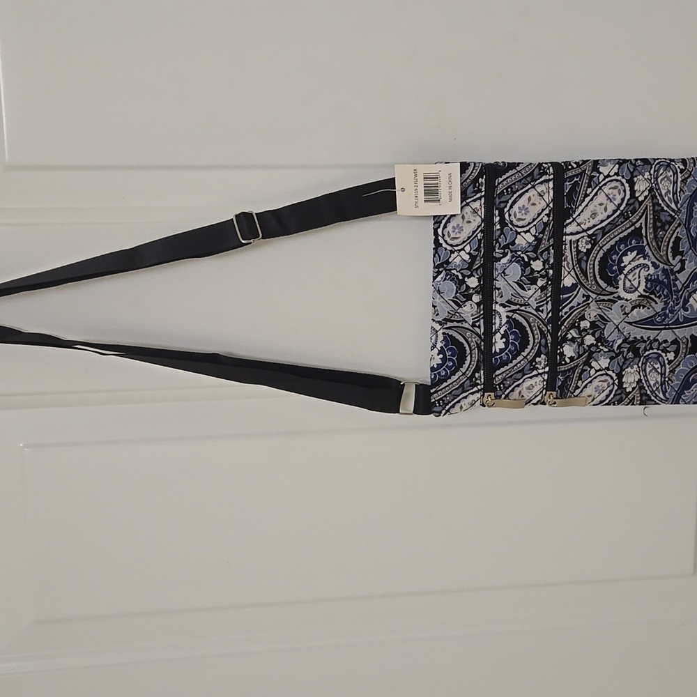 iPad, cell phone over the shoulder bag